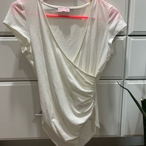 Pink Lilly white V-neck bodysuit